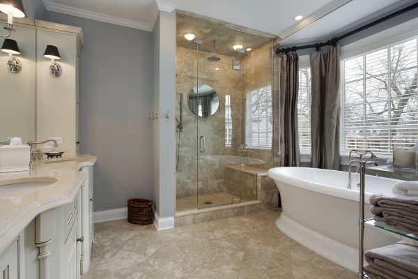 Complete Bathroom Remodel with double vanity sinks, custom bathtub and glass shower enclosure