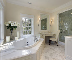 Master bath in luxury home with step up tub
